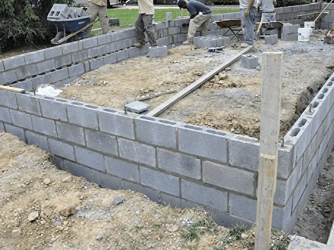 Professionals building a foundation with blocks in Tempe, AZ